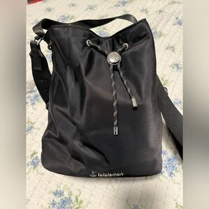 lululemon athletica Black Messenger Bag with Minimalist Design